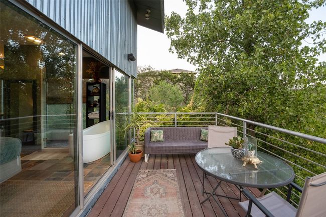 Balcony off second level primary bedroom with canyon greenbelt view. | Image 36