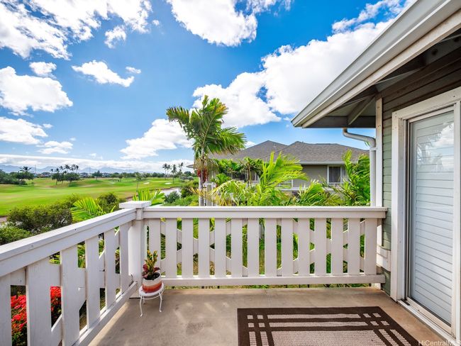 Main lanai off the living room/primary bedroom with golf course views | Image 21