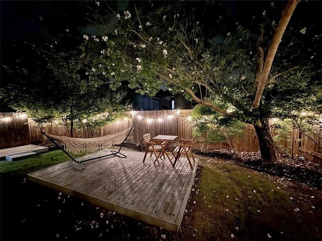 Deck featuring a fenced backyard | Image 29