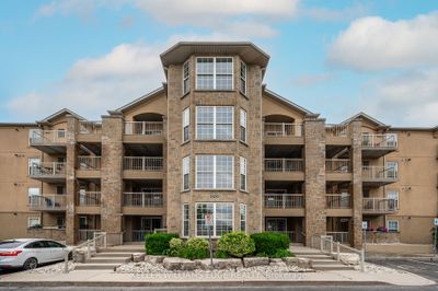 403 - 1800 Walkers Line, Condo with 2 bedrooms, 1 bathrooms and 1 parking in Burlington ON | Image 2