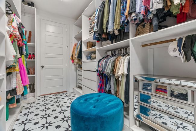Spacious closet featuring light flooring | Image 20