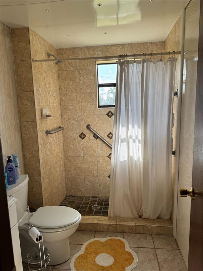 15950 Ne 50 Th St, Home with 4 bedrooms, 2 bathrooms and null parking in WILLISTON FL | Image 17