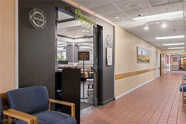 Common Hall featuring baseboards, tile patterned floors, and a drop ceiling | Image 26