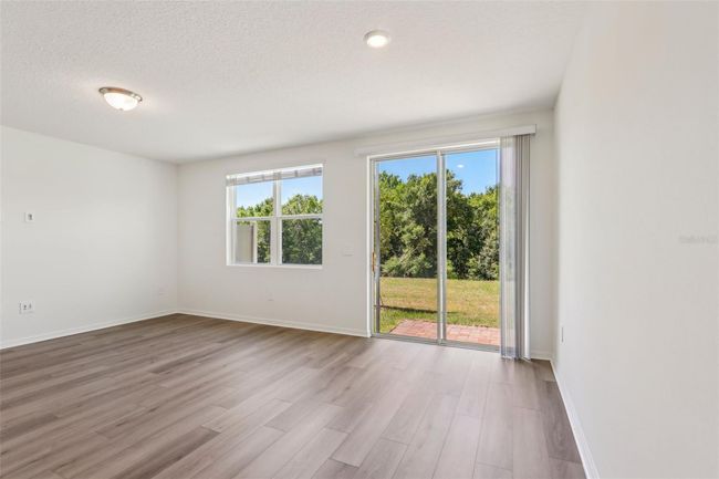 16419 Bird Of Paradise Ave, Townhouse with 3 bedrooms, 3 bathrooms and null parking in CLERMONT FL | Image 16