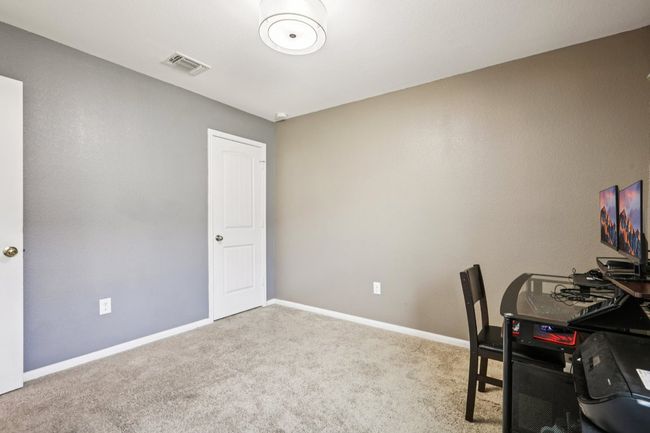 Carpeted office space with baseboards | Image 25