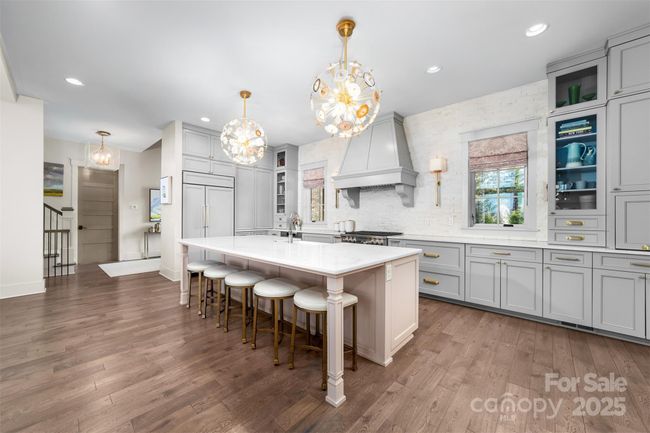 The impressive chef's kitchen was designed with clean lines and style. | Image 7