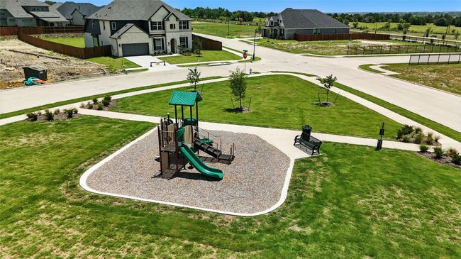 Surrounding community featuring a garage | Image 36