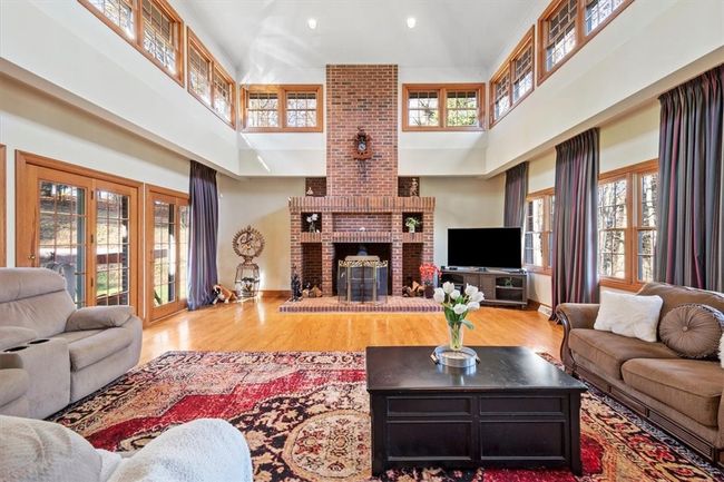 Grand Living area with soaring ceilings | Image 6