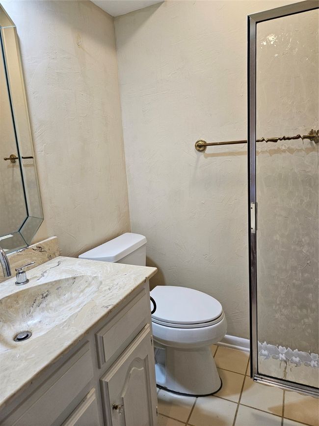 Half bath with vanity and tile patterned flooring | Image 15