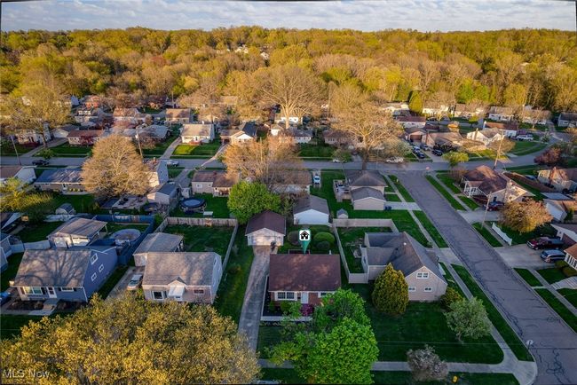 Drone / aerial view featuring a wooded view and a residential view | Image 43