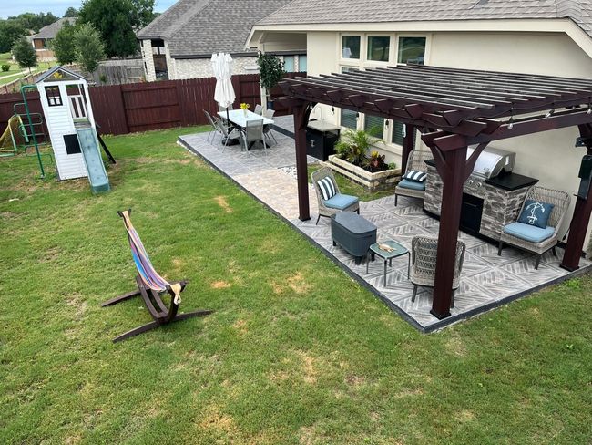 View of yard with a pergola, a playground, and a patio | Image 29