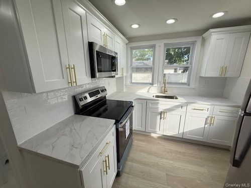 1-336 Oceanside Pkwy, Oceanside, NY, 11572-2552 | Card Image