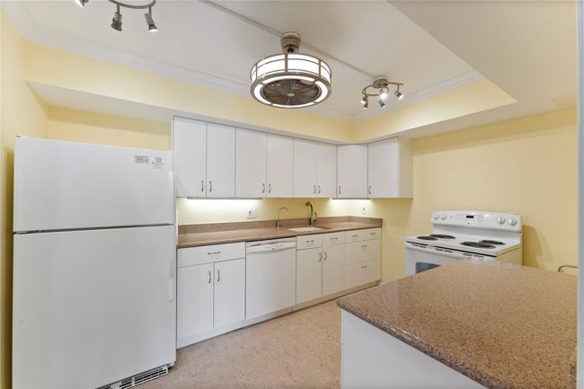 Granite counters, cork floor | Image 20