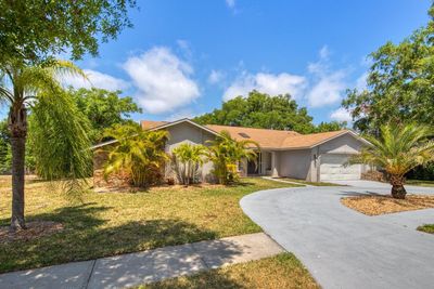 209 Normandy Circle W, House other with 4 bedrooms, 3 bathrooms and null parking in Palm Harbor FL | Image 3