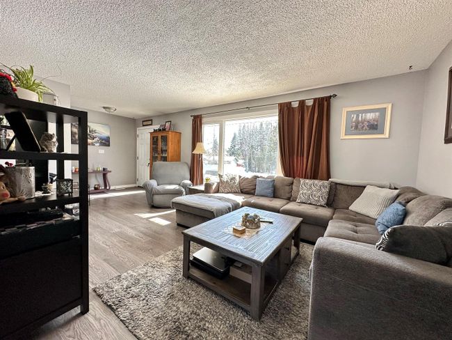 93 Feero Drive, Home with 4 bedrooms, 2 bathrooms and 4 parking in Whitecourt AB | Image 3
