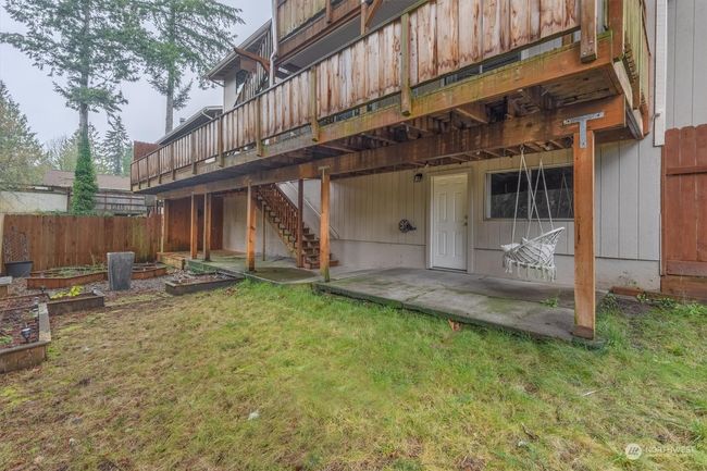 back yard. the patio leads to the lower level gym | Image 33