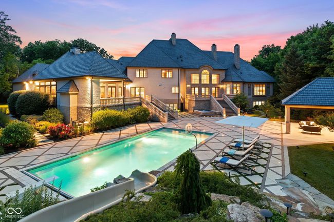 Pool featuring slide | Image 102