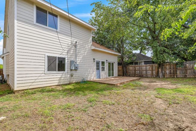 Rear view of property featuring a wooden deck | Image 28