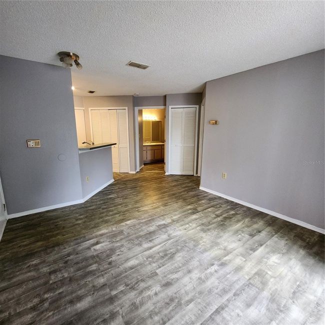 Living room towards kitchen | Image 5