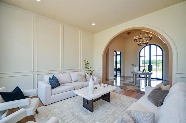 Formal living room with view of the foyer. | Image 27