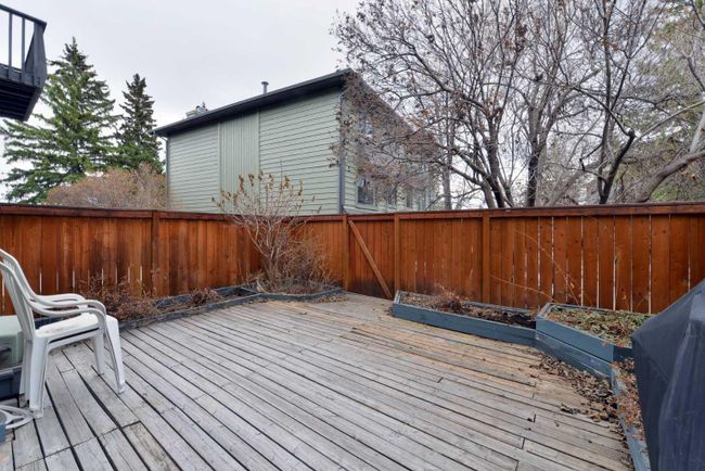 33 - 10030 Oakmoor Way Sw, Home with 3 bedrooms, 1 bathrooms and 2 parking in Calgary AB | Image 9