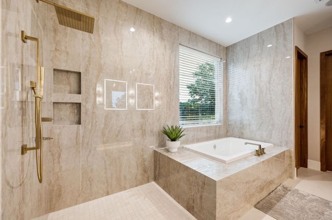 Bathroom featuring a garden tub, a tile shower, and recessed lighting | Image 18