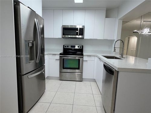 104-25-423 Ne 210th Circle Ter, Miami, FL, 33179-1849 | Card Image