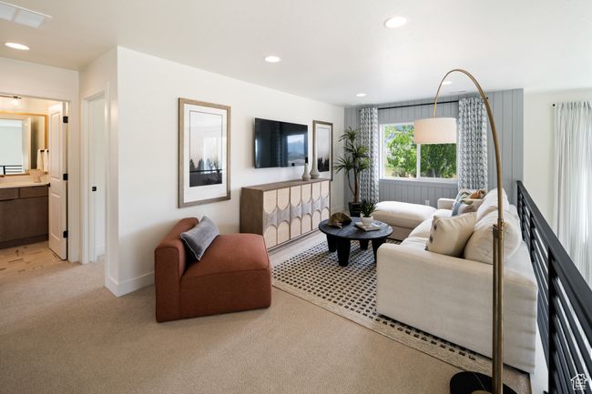 Living room with light carpet, recessed lighting, and baseboards | Image 17