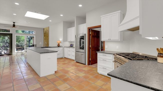 Custom built kitchen with lots of work countertops | Image 14