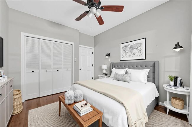 Experience comfort and style in this inviting bedroom no.4, featuring a plush bed, ample closet space, and elegant modern décor. Perfect for relaxation. | Image 28
