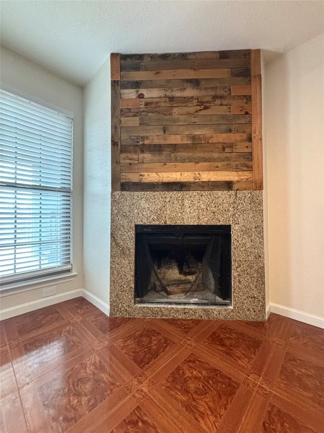 Detailed view of decorative style wood burning fireplace | Image 7