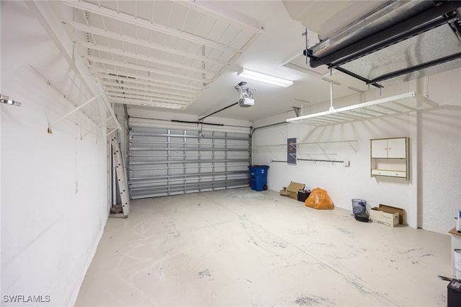 2 car garage with custom storage racks | Image 30
