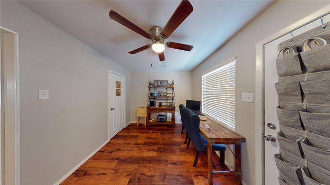 Office featuring baseboards, ceiling fan, and wood finished floors | Image 6