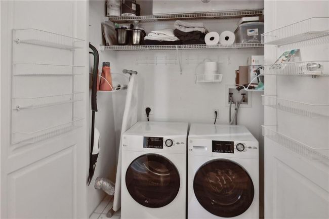 Laundry with washer and clothes dryer. | Image 13