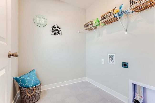Upper level laundry makes this task much more convenient. Photo of model home, color & options will vary. | Image 19