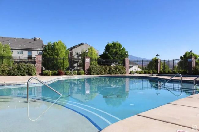 View of swimming pool featuring a mountain view | Image 48