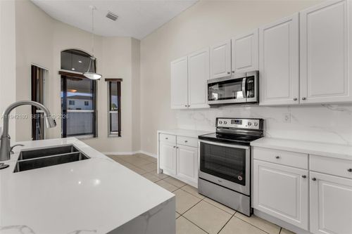 1856 Ne 3rd Ct, Homestead, FL, 33033-5208 | Card Image