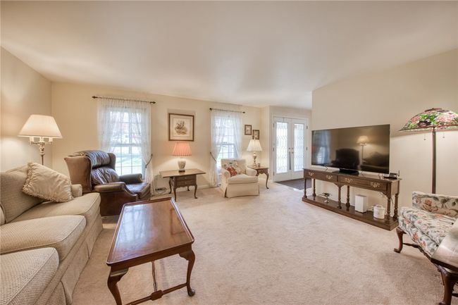 Living room with tons of natural sunlight and space | Image 4