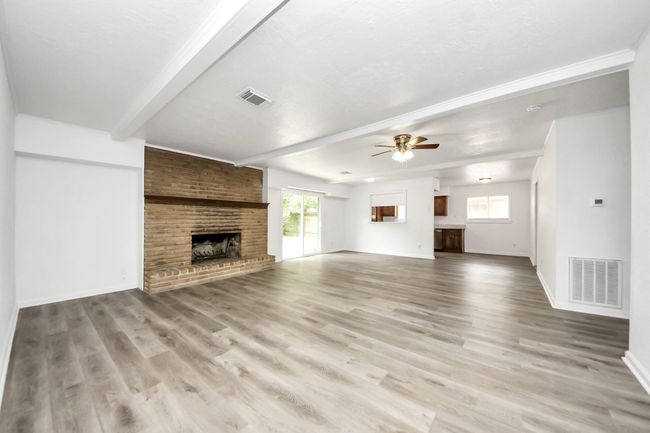 Oversized open floor plan, looking into kitchen. | Image 6