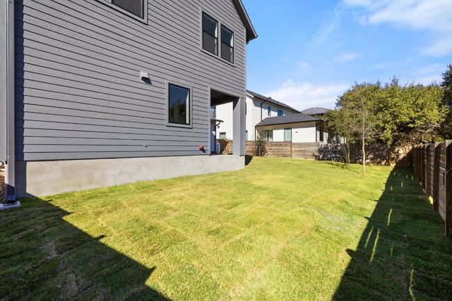 View of yard featuring a fenced backyard | Image 33