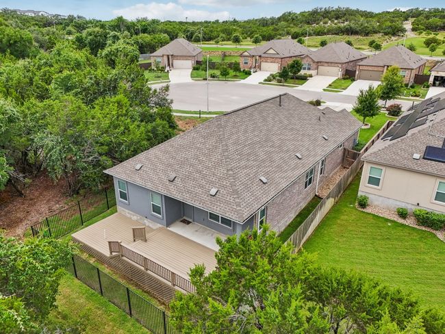 Home is set back from the road, behind the one neighboring home, with an extra long driveway offering privacy and seclusion. | Image 30
