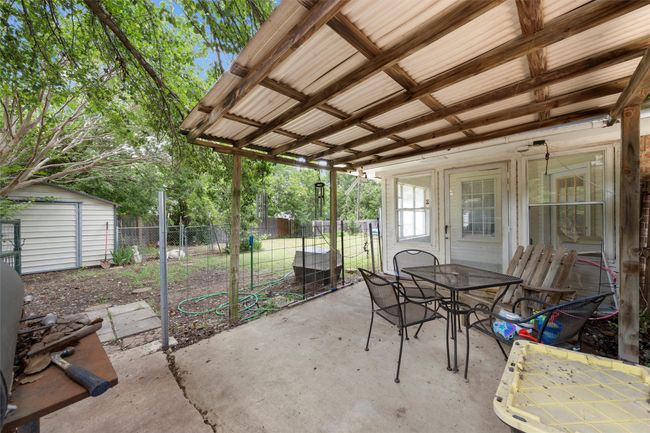 View of patio with outdoor dining space | Image 17