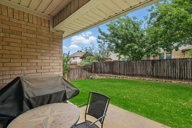 View of patio / terrace with a fenced backyard | Image 35