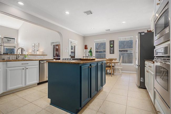An abundance of cabinets and counter space | Image 16