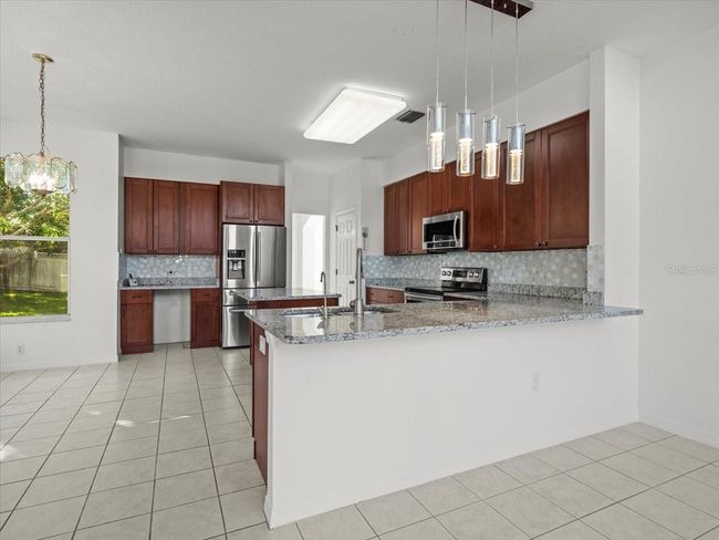 9701 Hidden Cove Ct, House other with 5 bedrooms, 3 bathrooms and null parking in Tampa FL | Image 15