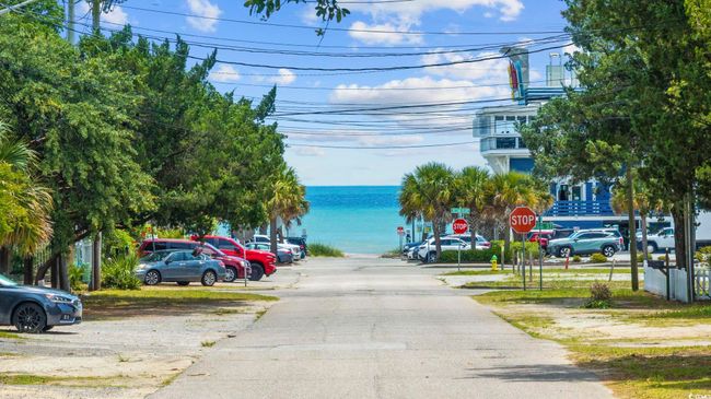 View of asphalt road featuring traffic signs | Image 21