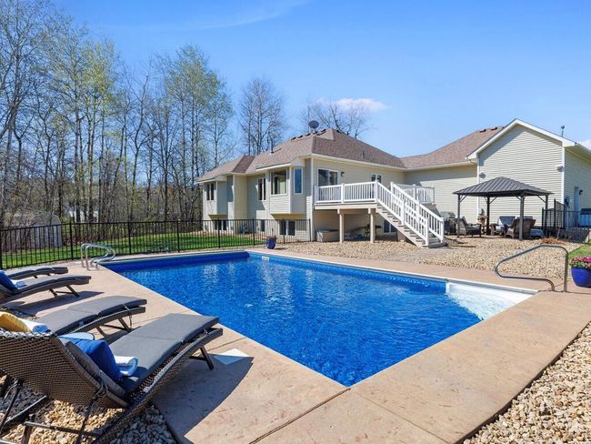 Heated Salt Water Pool with colored concrete apron - 25259 Galaxy Ave Wyoming MN 55092 USA-018-119-019-MLS_Size.jpg | Image 61