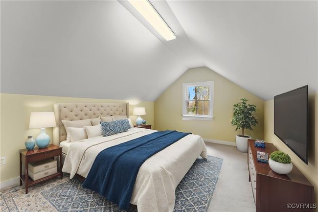 Bedroom featuring lofted ceiling and carpet floors | Image 13