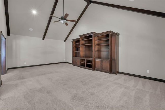 Possible Media Room or 5th Bedroom. High ceilings and ceiling fan. | Image 45