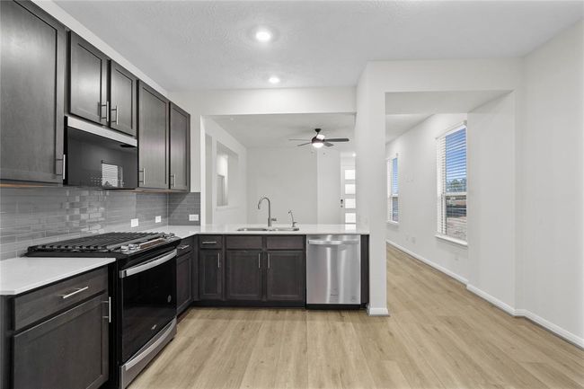 Additional view of this beautiful kitchen looking out towards the family room! | Image 9
